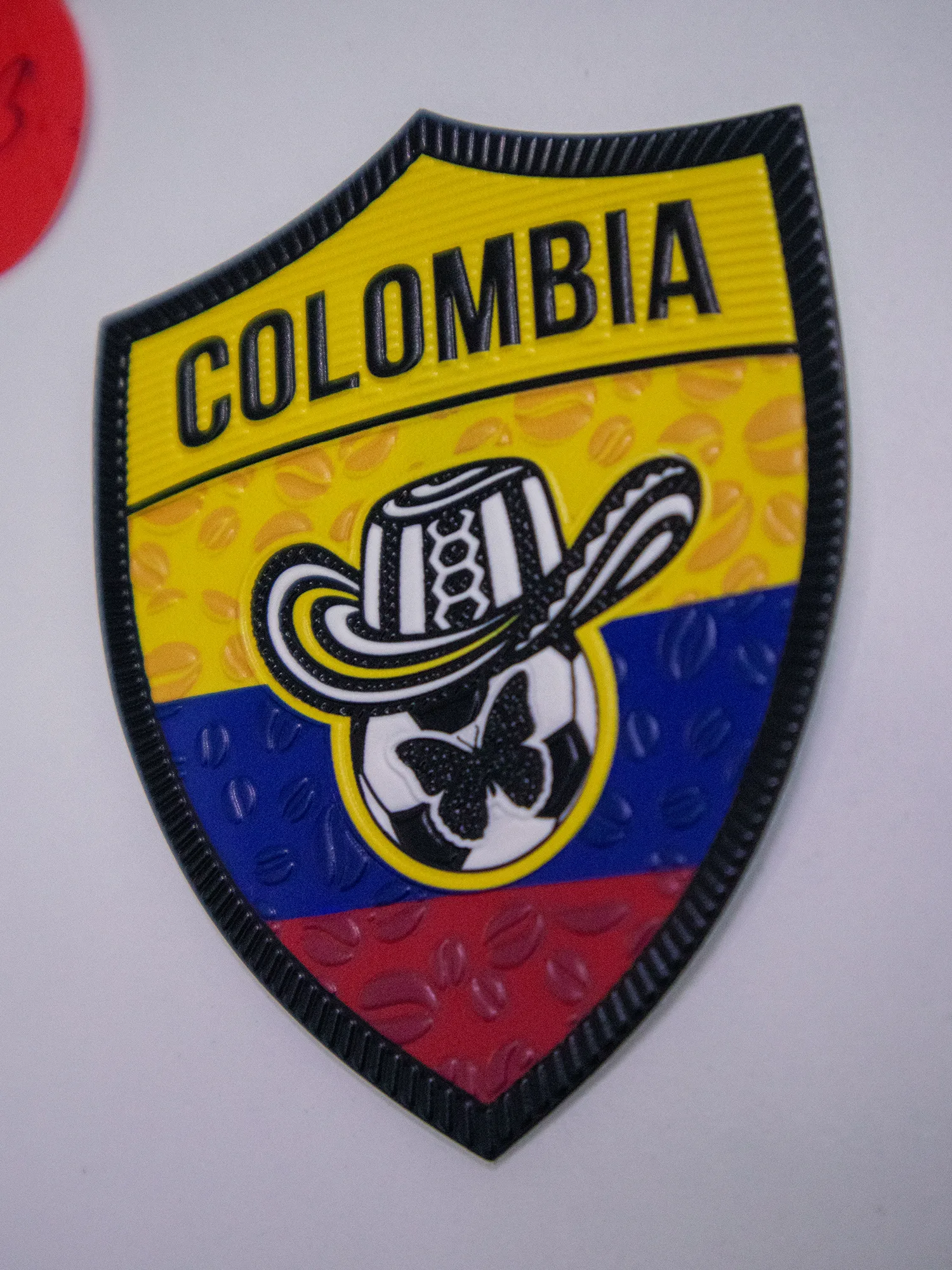 Custom logo applied to sportswear — 3D embroidery, flat embroidery and UV DTF