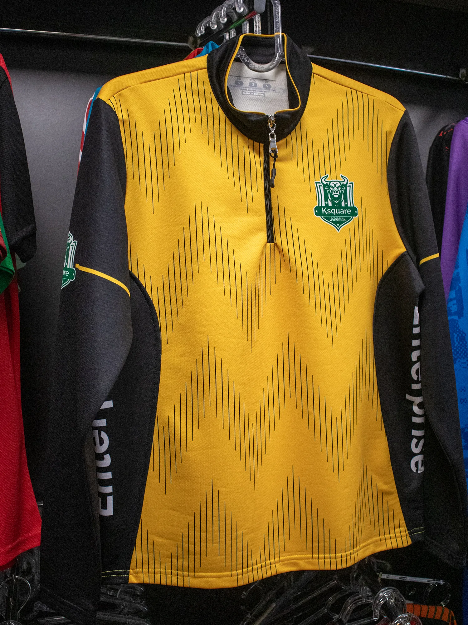 Custom white-label tracksuit top and pants manufactured for a sportswear brand